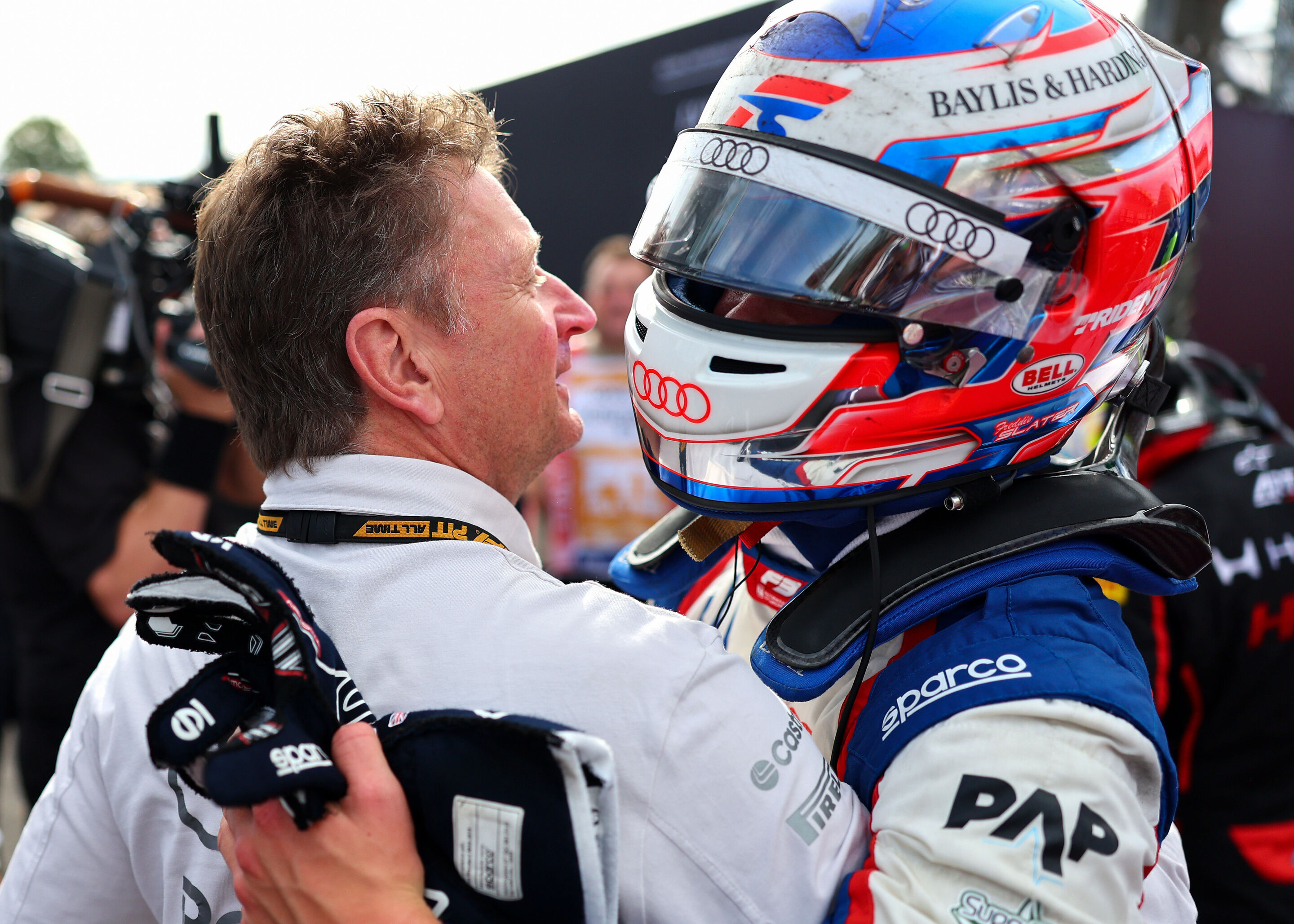 2026 Italian Grand Prix - F3 - MONZA, ITALY - SEPTEMBER 05: Second placed Freddie Slater of Great Britain and TRIDENT (5) and Audi F1 Team celebrates with Allan McNish, Racing Director of Audi F1 Team in parc ferme during the Round 8 Monza Sprint race...