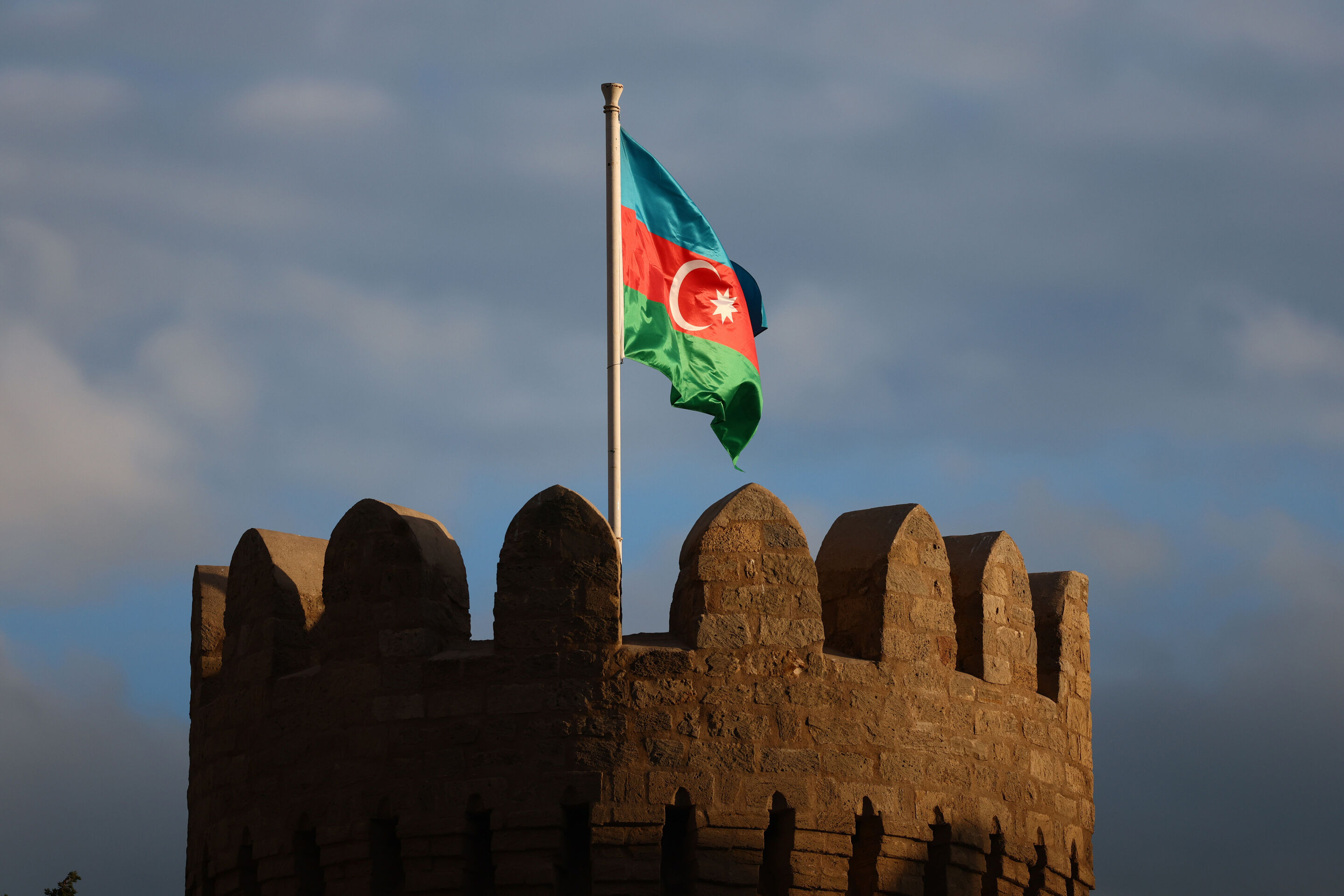 2236425532 - BAKU, AZERBAIJAN - SEPTEMBER 20: The Azerbaijan flag flies on top of Shirvanshahs' Palace during qualifying ahead of the F1 Grand Prix of Azerbaijan at Baku City Circuit on September 20, 2025 in Baku, Azerbaijan. (Photo by Clive Rose/Getty...