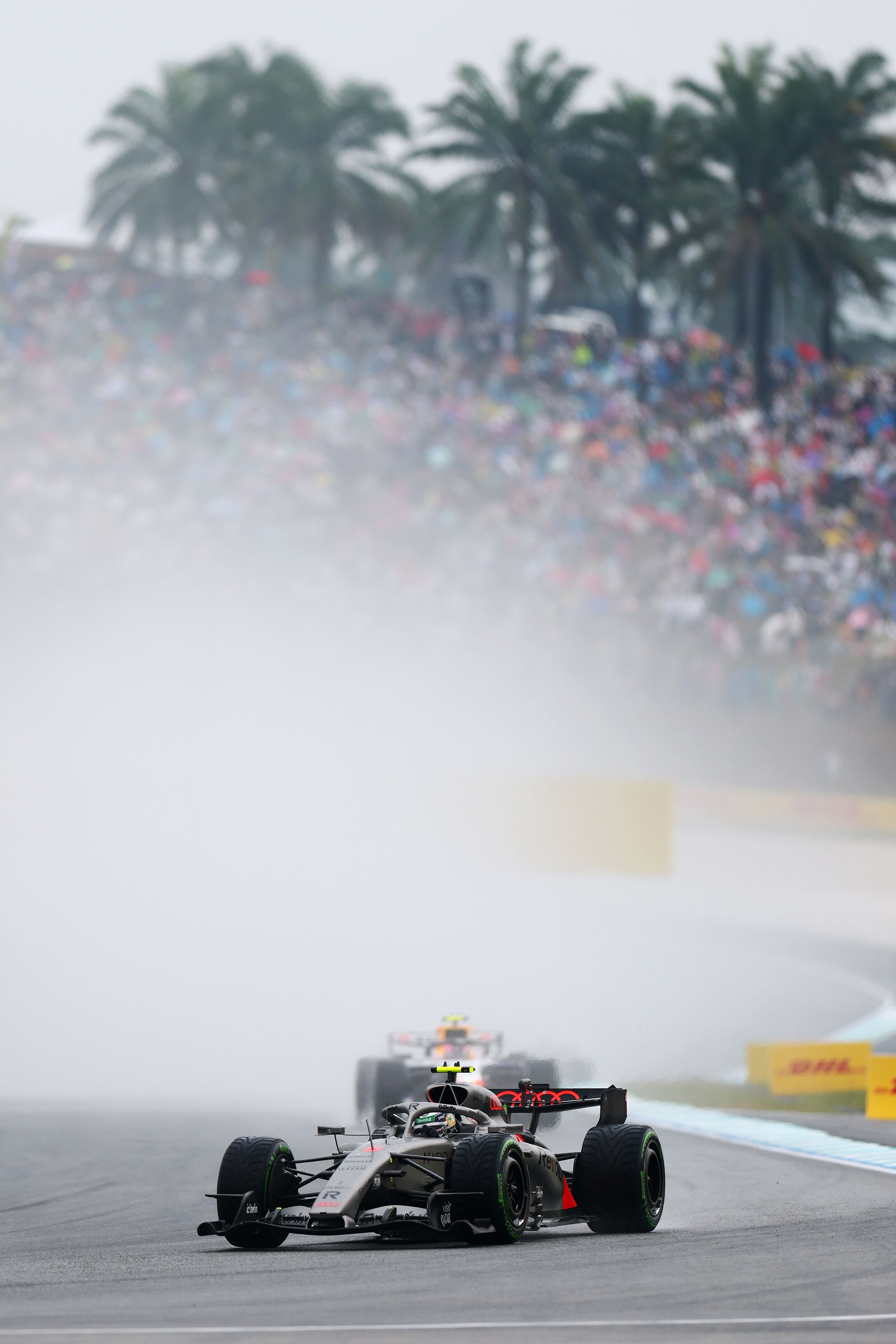 F1 Grand Prix of Bahrain in Malaysia - KUALA LUMPUR, MALAYSIA - OCTOBER 04: Gabriel Bortoleto of Brazil driving the (5) Audi F1 Team R26 leads Liam Lawson of New Zealand driving the (30) Visa Cash App Racing Bulls VCARB 03 RB Ford on the formation lap...