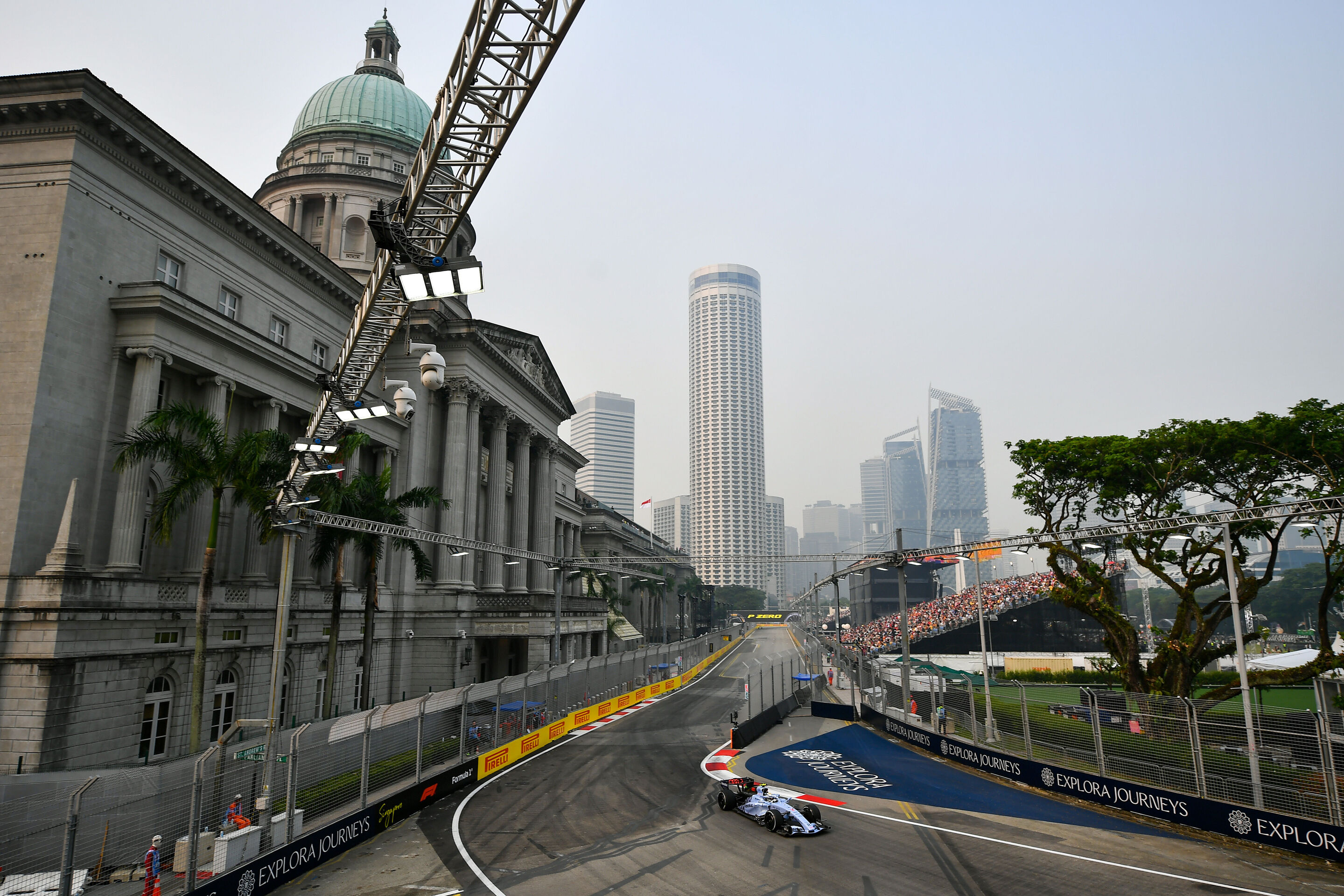 F1 Grand Prix Of Singapore - Practice & Sprint Qualifying - SINGAPORE, SINGAPORE - OCTOBER 09: Gabriel Bortoleto of Brazil driving the (5) Audi F1 Team R26 on track during practice ahead of the F1 Grand Prix of Singapore at Marina Bay Street Circuit on...