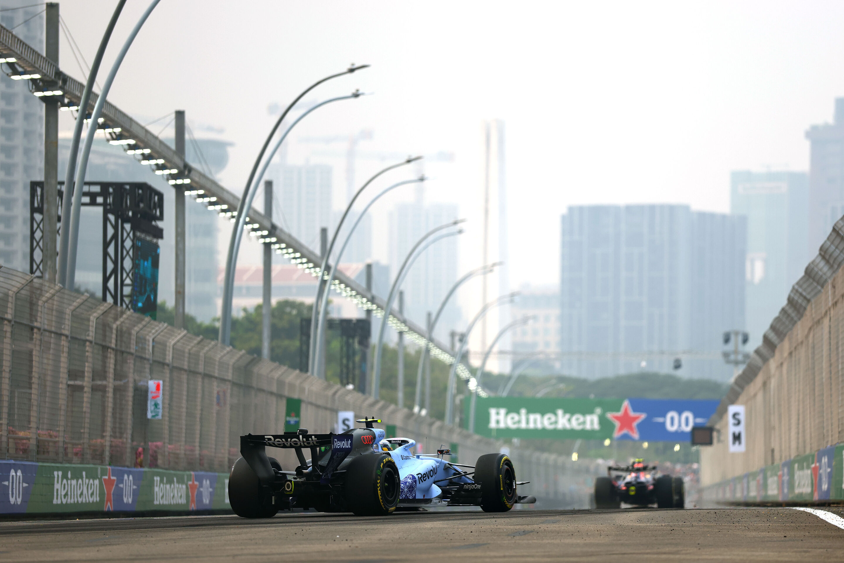 F1 Grand Prix Of Singapore - Practice & Sprint Qualifying - SINGAPORE, SINGAPORE - OCTOBER 09: Gabriel Bortoleto of Brazil driving the (5) Audi F1 Team R26 on track during practice ahead of the F1 Grand Prix of Singapore at Marina Bay Street Circuit on...