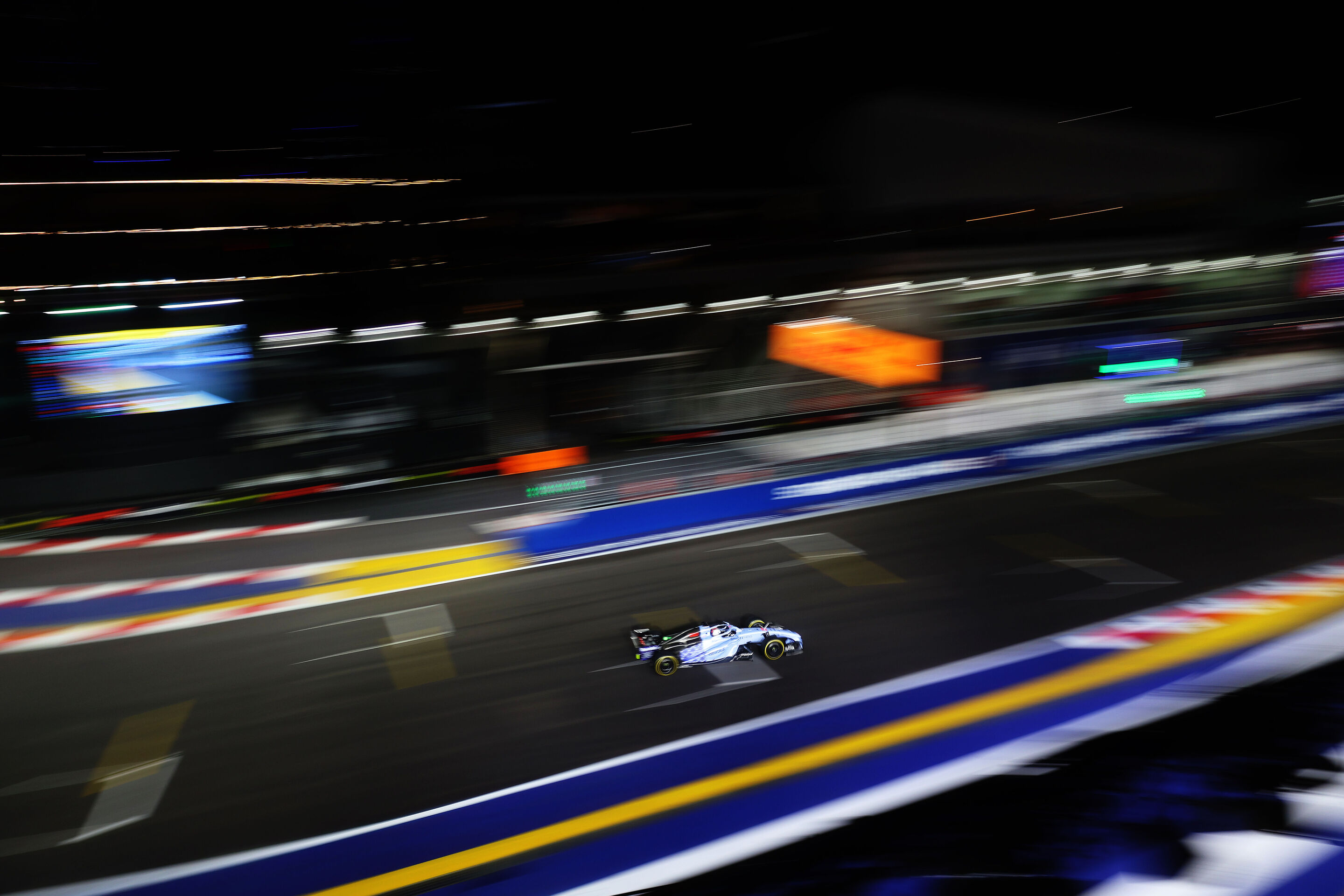 F1 Grand Prix Of Singapore - Practice & Sprint Qualifying - SINGAPORE, SINGAPORE - OCTOBER 09: Nico Hulkenberg of Germany driving the (27) Audi F1 Team R26 on track during Sprint Qualifying ahead of the F1 Grand Prix of Singapore at Marina Bay Street...