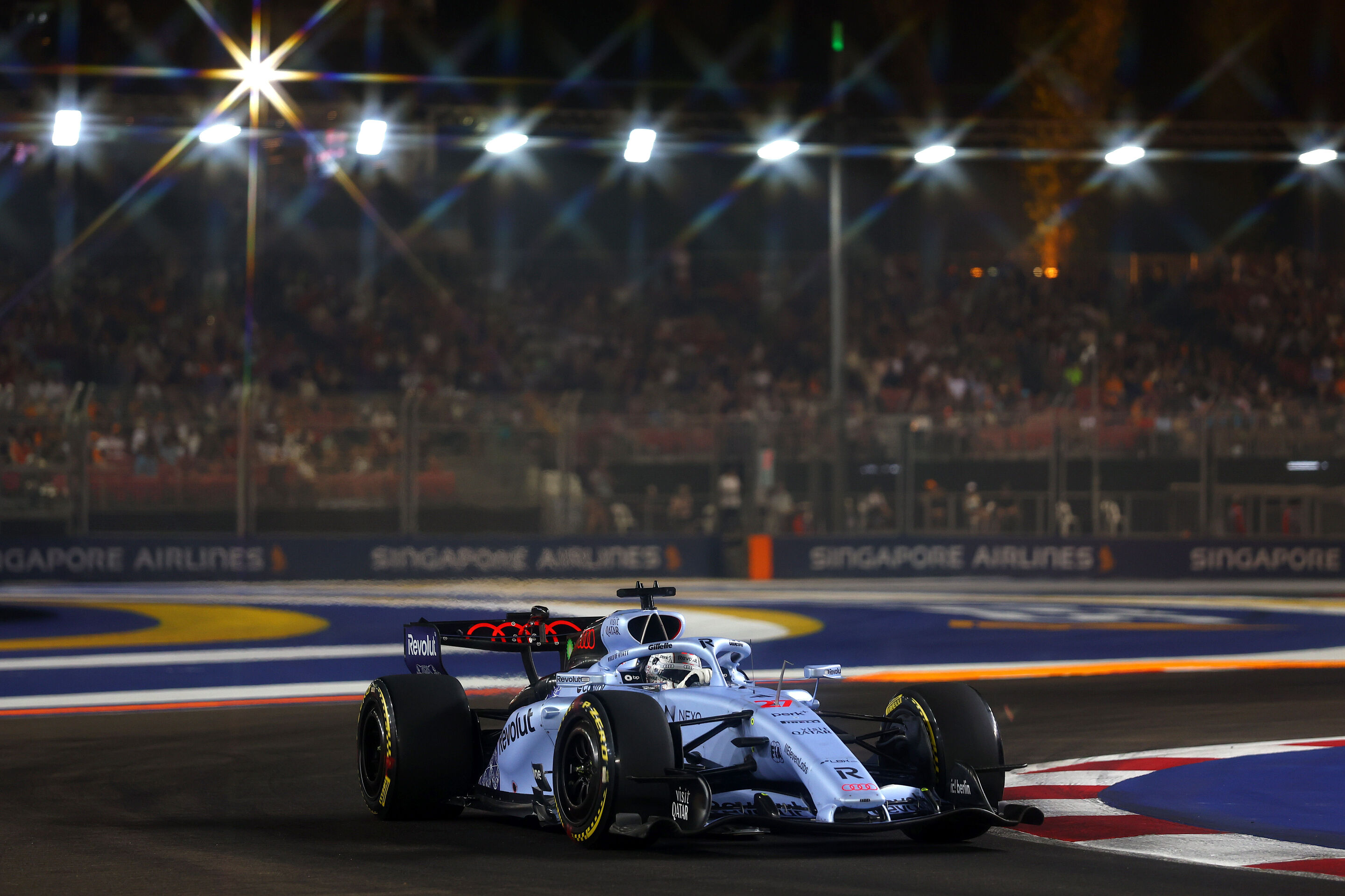 F1 Grand Prix Of Singapore - Practice & Sprint Qualifying - SINGAPORE, SINGAPORE - OCTOBER 09: (EDITORS NOTE: Image has been created using a starburst filter) Nico Hulkenberg of Germany driving the (27) Audi F1 Team R26 on track during Sprint Qualifying...