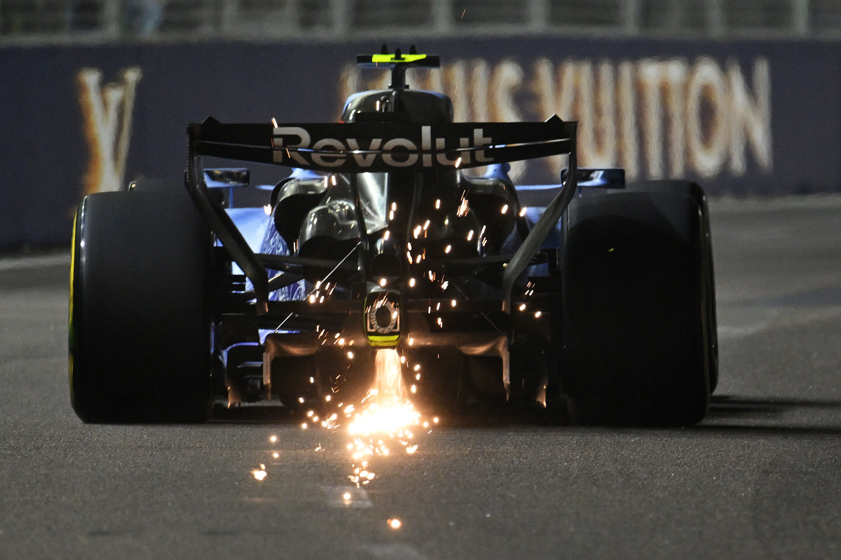 F1 Grand Prix Of Singapore - Practice & Sprint Qualifying - SINGAPORE, SINGAPORE - OCTOBER 09: Sparks fly behind Gabriel Bortoleto of Brazil driving the (5) Audi F1 Team R26 on track during Sprint Qualifying ahead of the F1 Grand Prix of Singapore at...