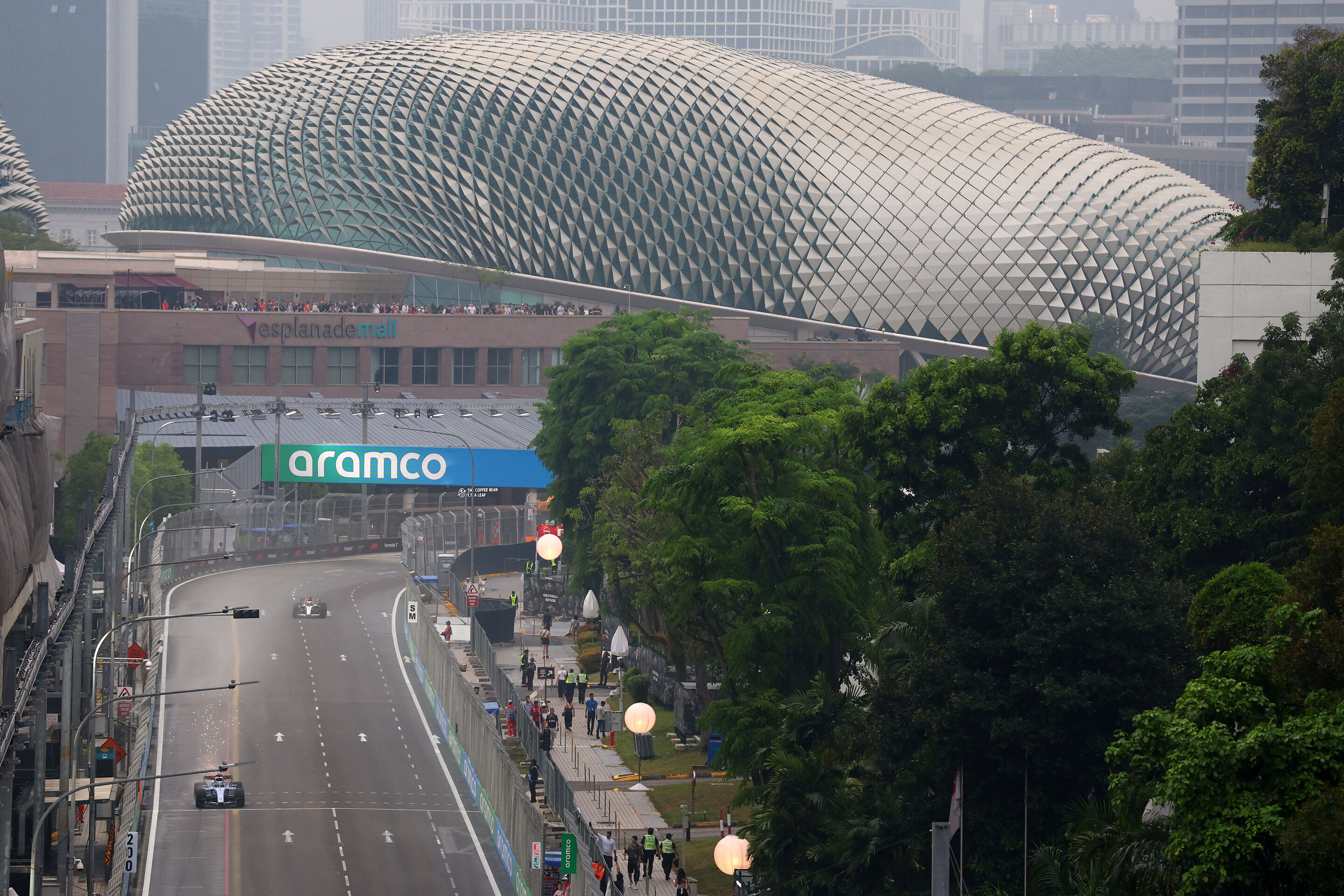 F1 Grand Prix Of Singapore - Sprint & Qualifying - SINGAPORE, SINGAPORE - OCTOBER 10: Sparks fly behind Nico Hulkenberg of Germany driving the (27) Audi F1 Team R26 on track during the Sprint ahead of the F1 Grand Prix of Singapore at Marina Bay Street...