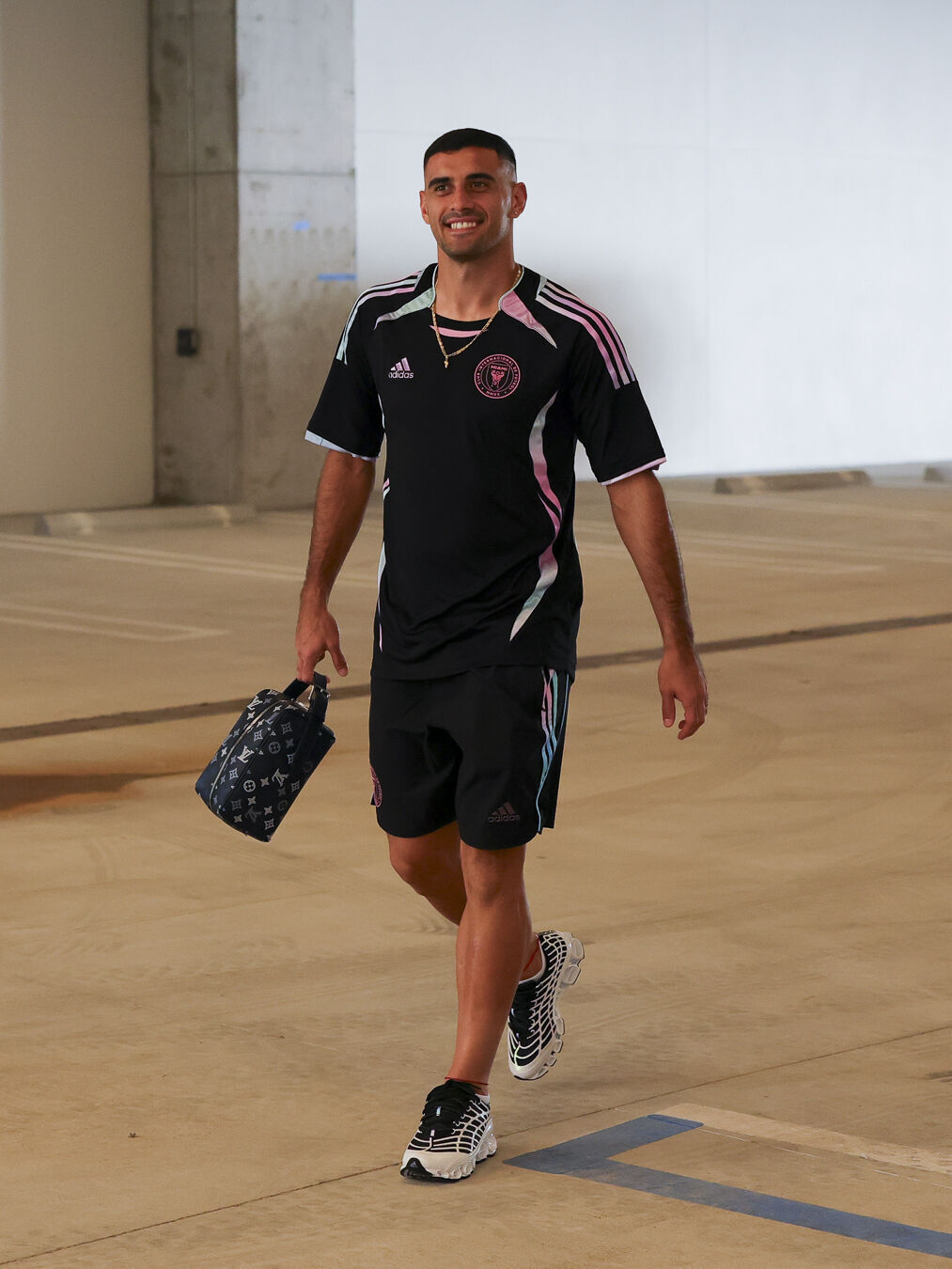 Inter Miami CF players arrive for gameday in limited-edition kit - Inter Miami CF players arrive for gameday in limited-edition kit, celebrating the Audi Revolut F1 Team x adidas Miami Collection