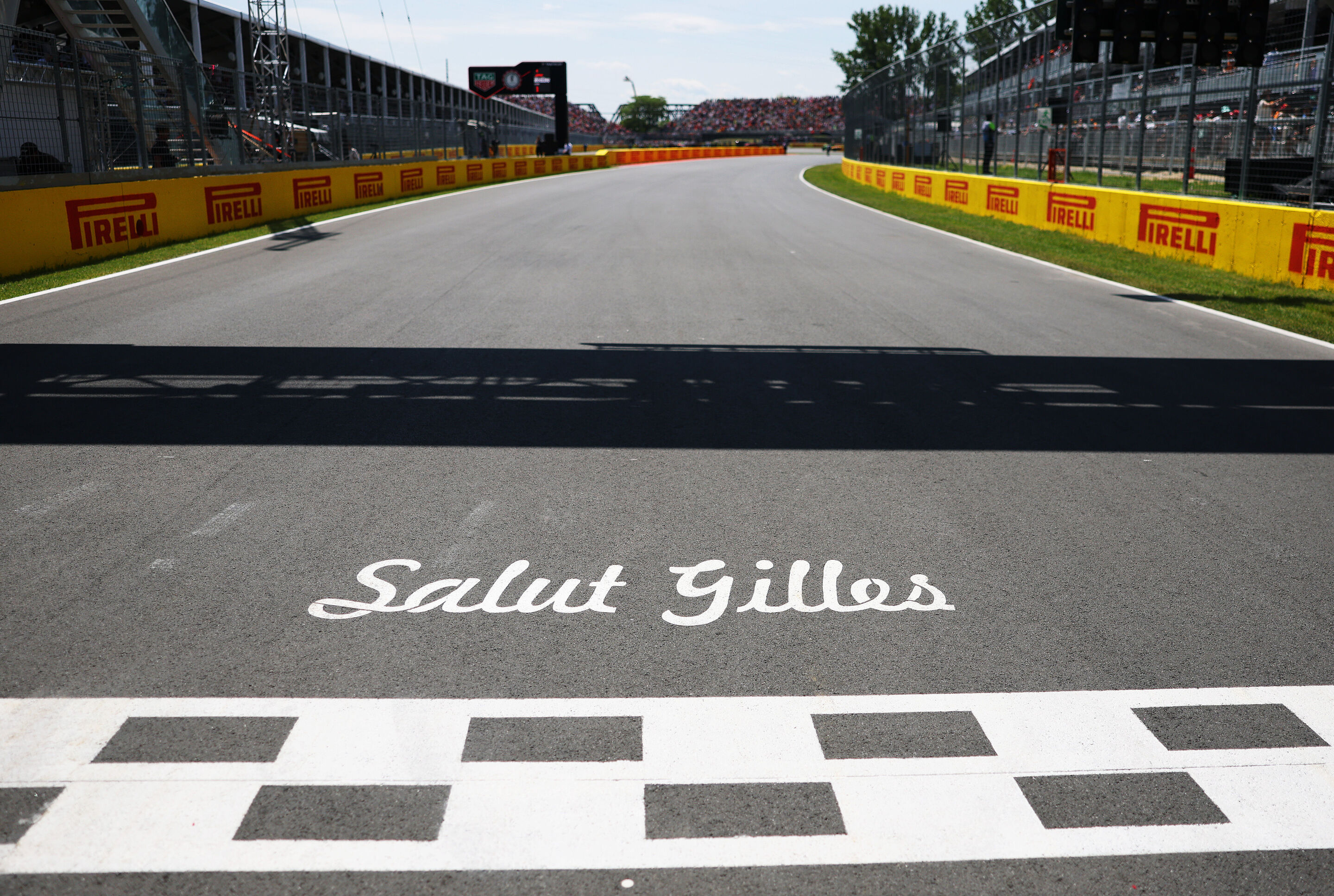 2220268470 - MONTREAL, QUEBEC - JUNE 15: Salut Gilles written on the tarmac at the start-finish line prior to the F1 Grand Prix of Canada at Circuit Gilles-Villeneuve on June 15, 2025 in Montreal, Quebec. (Photo by Mark Thompson/Getty Images)