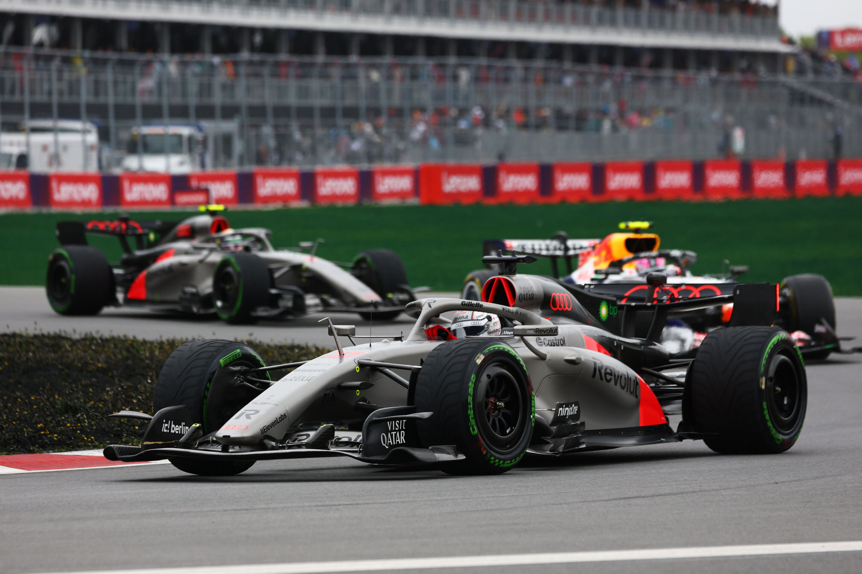 F1 Grand Prix of Canada - MONTREAL, QUEBEC - MAY 24: Nico Hulkenberg of Germany driving the (27) Audi F1 Team R26 leads Liam Lawson of New Zealand driving the (30) Visa Cash App Racing Bulls VCARB 03 RB Ford on the formation lap during the F1 Grand Prix...